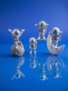 An imaginative scene featuring astronauts floating in a vibrant space setting.