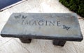 Imagine concrete bench engraving.