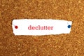 Declutter word on white paper