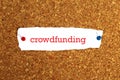 Crowdfunding word on white paper