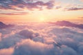 Imagine the top of the Alps mountains covered in clouds during sunrise in a foggy, golden hour Royalty Free Stock Photo