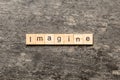 imagine word written on wood block. imagine text on table, concept Royalty Free Stock Photo