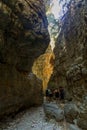 IMBROS GORGE, CRETE - 23 JULY 2021: Hikers exploring the narrow canyons and terrain of the Imbros Gorge in central Crete, Greece Royalty Free Stock Photo