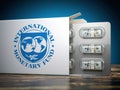 IMF International Monetary Fund tranches concept. Pack of dollars as pills in blister pack