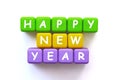 Happy new year text written on colourful cubes Royalty Free Stock Photo