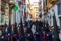 Hermandad de San Bernardo going in procession during the annual Semana Santa in the centre of Seville Royalty Free Stock Photo