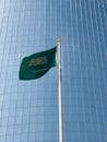 The Saudi National Flag with the Kingdom Tower in the Background. Royalty Free Stock Photo