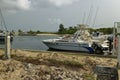 Private Sport Fishing Boats and Yachts moored at a Marina set back from the Beach at Port Gentil in Gabon Royalty Free Stock Photo