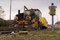 Railway plow for gravel profiling