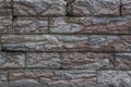 Old wall. Imitation of brick masonry from artificial stone.