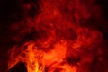 Imitation of bright flashes of orange-red flame. Background of abstract colored smoke Royalty Free Stock Photo