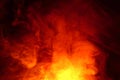 Imitation of bright flashes of orange-red flame. Background of abstract colored smoke Royalty Free Stock Photo