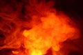 Imitation of bright flashes of orange-red flame. Background of abstract colored smoke Royalty Free Stock Photo