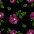Imitation embroidery rosehip seamless pattern on black background
