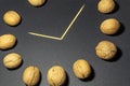 Imitation of a walnut clock fragment on a black background