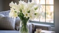 Immaculate Perfectionism: White Flowers In A Glass Vase On A Couch