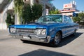 immense blue classic American car Dodge Polara.