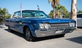 immense blue classic American car Dodge Polara.