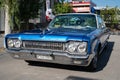 immense blue classic American car Dodge Polara. Royalty Free Stock Photo