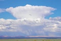 Immense Cumulonimbus cloud over red cliffs of northern Arizona Royalty Free Stock Photo