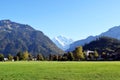 Interlaken, Switzerland, Immense lawn garden surrounded by giant mountains Royalty Free Stock Photo