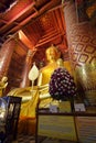 Immense 19m tall gilded seated Buddha image at Wat Phanan Choeng, a historical and culturally important Buddhist temple, Ayutthaya