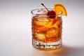 close-up shot of old fashioned cocktail, isolated in gray color background.