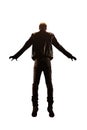 Silhouette of a man in a black jacket and jeans isolated on white background. Back view silhouette of a man floating in the air. Royalty Free Stock Photo