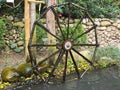 Tranquil Oasis: Serene Water mill Wheels in Park\'s Pond
