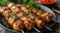 Gourmet Elegance: Top View of Close-Up Chicken Kebab Skewers on Black Plate