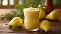 Pear Juice Resting on a rustic wooden table