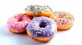 Sweet Temptations: Assorted Colorful Donuts on a White Canvas