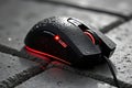 Immersive Gaming Experience Red LEDLit WaterResistant Modern Gaming Mouse for Superior Performance and Control Royalty Free Stock Photo