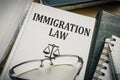 Immigration law book. Legislation and justice concept Royalty Free Stock Photo