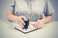 Immigration and passport control at the airport. woman border control officer puts a stamp in the passport. Concept.