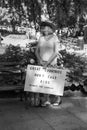 Woman Holds Reunite Families sign at Immigration Rally