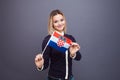 Immigration and the study of foreign languages, concept. A young smiling woman with a Croatia flag in her hand. Royalty Free Stock Photo