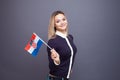 Immigration and the study of foreign languages, concept. A young smiling woman with a Croatia flag in her hand. Royalty Free Stock Photo