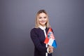 Immigration and the study of foreign languages, concept. A young smiling woman with a Croatia flag in her hand. Royalty Free Stock Photo