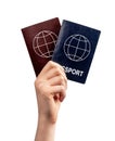 Immigration. Woman hand holding two passports isolated on white background. Multiple, dual nationality, change of