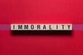 Immorality word concept on cubes