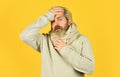 Immune response Bearded man sick. Warm scarf around neck. More than just symptom of illness. Hipster fever. Cold flu Royalty Free Stock Photo