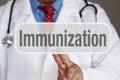 Immunization Button - Doctor touching screen Royalty Free Stock Photo