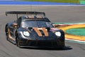 Imola, 12 May 2022: #18 Porsche 911 RSR 19 of ABSOLUTE RACING HKG Team driven by Haryanto - Picariello in action during Practice Royalty Free Stock Photo