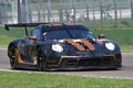 Imola, 12 May 2022: #18 Porsche 911 RSR 19 of ABSOLUTE RACING HKG Team driven by Haryanto - Picariello in action during Practice Royalty Free Stock Photo