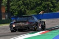 Imola, 12 May 2022: #18 Porsche 911 RSR 19 of ABSOLUTE RACING HKG Team driven by Haryanto - Picariello in action during Practice Royalty Free Stock Photo