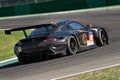 Imola, 12 May 2022: #18 Porsche 911 RSR 19 of ABSOLUTE RACING HKG Team driven by Haryanto - Picariello in action during Practice Royalty Free Stock Photo