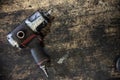 Impact wrench on a old table in workshop. Royalty Free Stock Photo