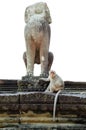 Monkey statue in Angkor with marmoset