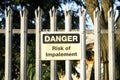 Impalement danger and risk sign on fence for security and protection Royalty Free Stock Photo